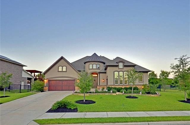 front with sidewalk and wonderful landscaping