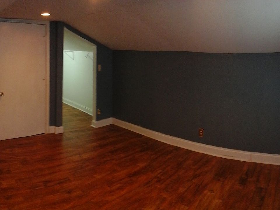 Bedroom with walk-in closet.