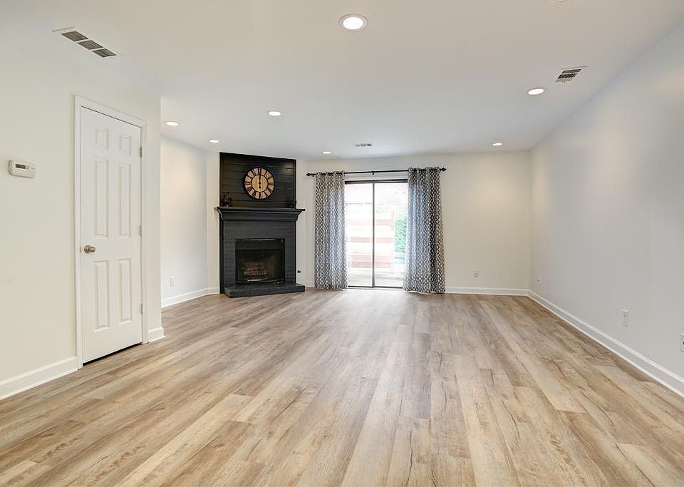 Wood burning fireplace & and luxury flooring.