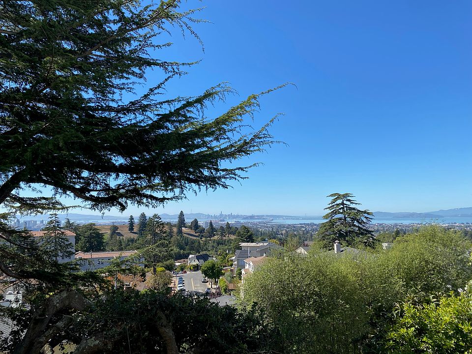 Panoramic view of downtown Oakland, San Francisco, Bay Bridge, and Marin