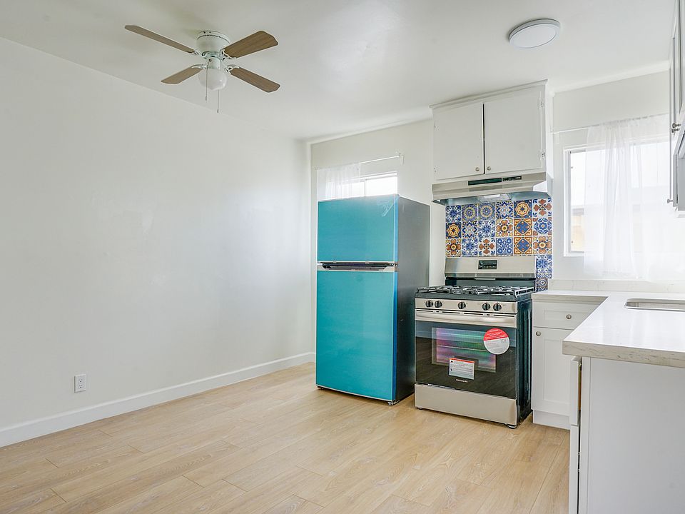 new kitchen, ref, stove, exhaust ,stainless sink, faucet ( quartz countertop, shaker cabinet ) deco tiles
