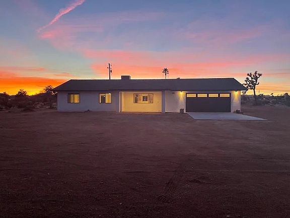 Front of house at sunset