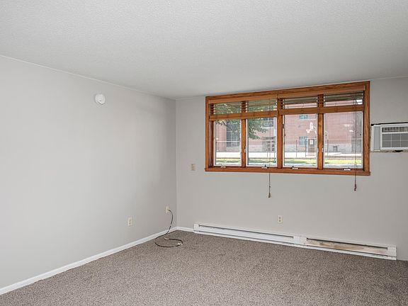 Photo of Unit 102, garden level. 202 has a balcony. Floor plan and finishes are the same. Call today for a showing