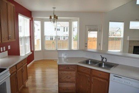 LARGE KITCHEN WITH ATTACHED DINING AREA