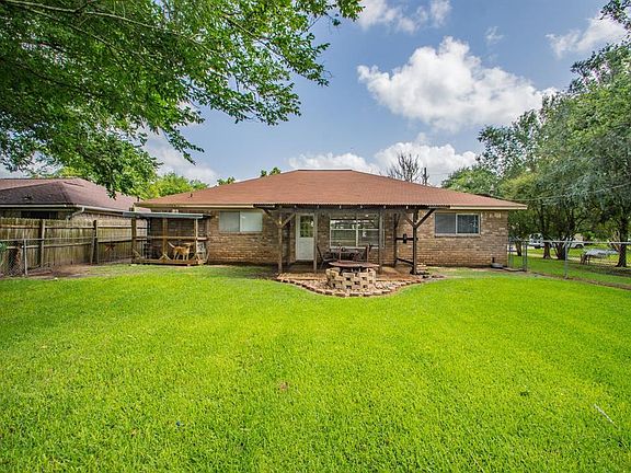 Backyard includes nice patio for relaxing and BBQing!
