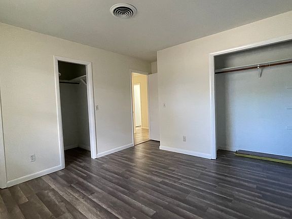 Front Bedroom with half bath and two closets