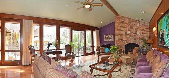 Formal Living Room with wet bar and view of pool
