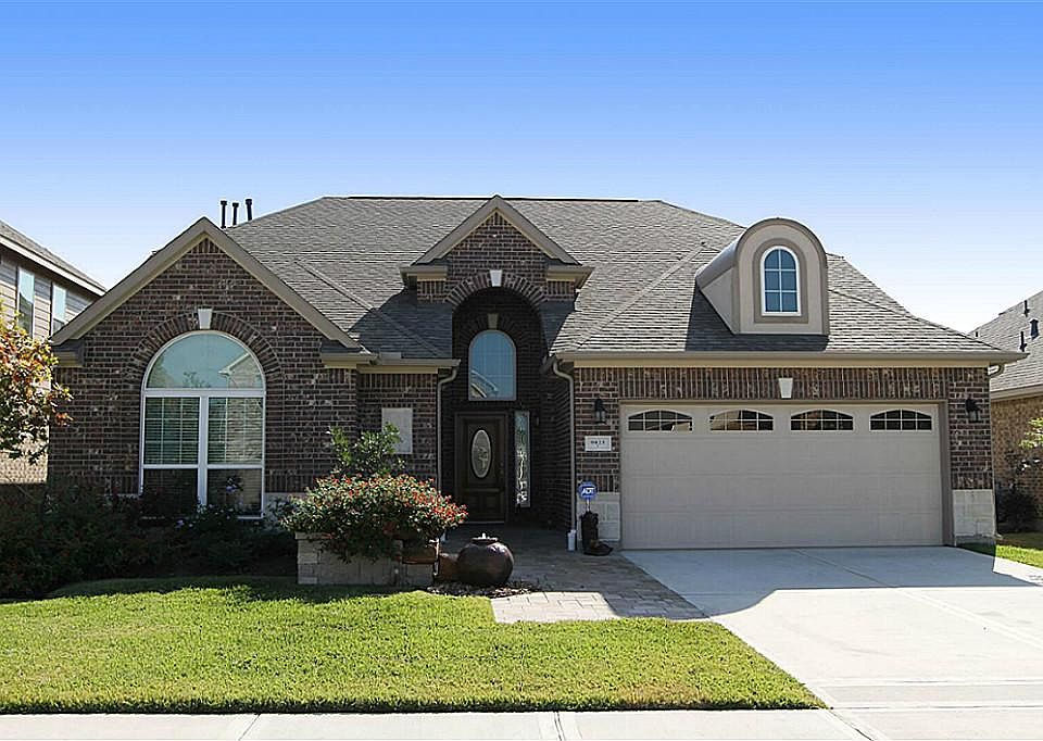 All brick 5 bedroom Ryland home completed in 2011. Additional paver patio, fountain, sprinklers, and
