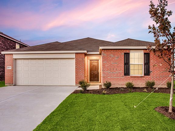 The Serenada, a one-story home with 2-car garage, shown with Home Exterior N
