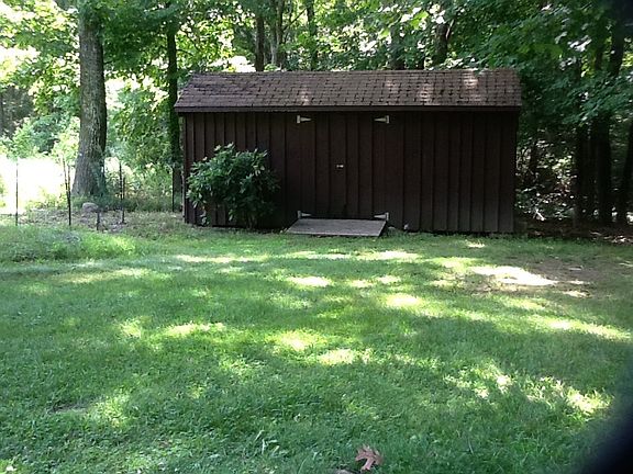 Shed with fenced area