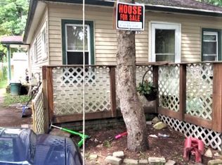 765 Six Mile Rd, Whitmore Lake, MI 48189