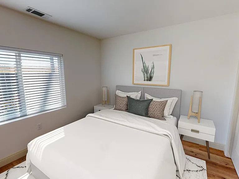 Bedroom 2. This image shows a virtually furnished space. Bedrooms come unfurnished.