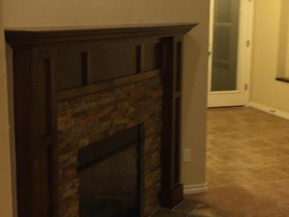 Beautiful stacked stone gas fireplace
