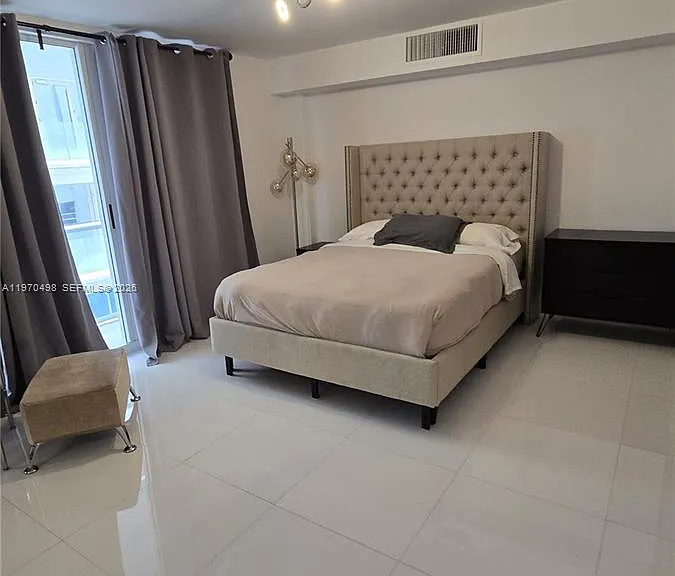 9195 Collins Ave #406 — Photo 1