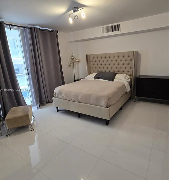 9195 Collins Ave #406