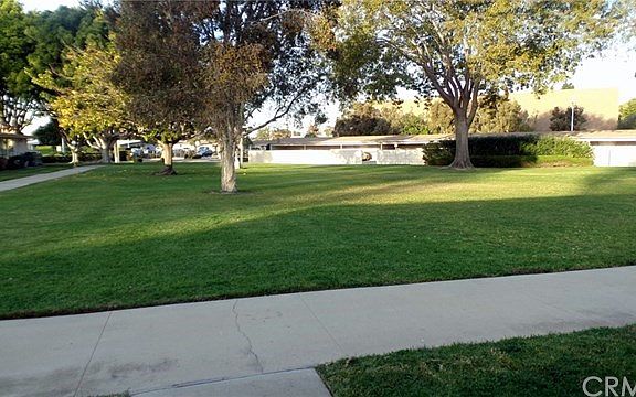 Nice  Greenbelt location  With Carport directly across