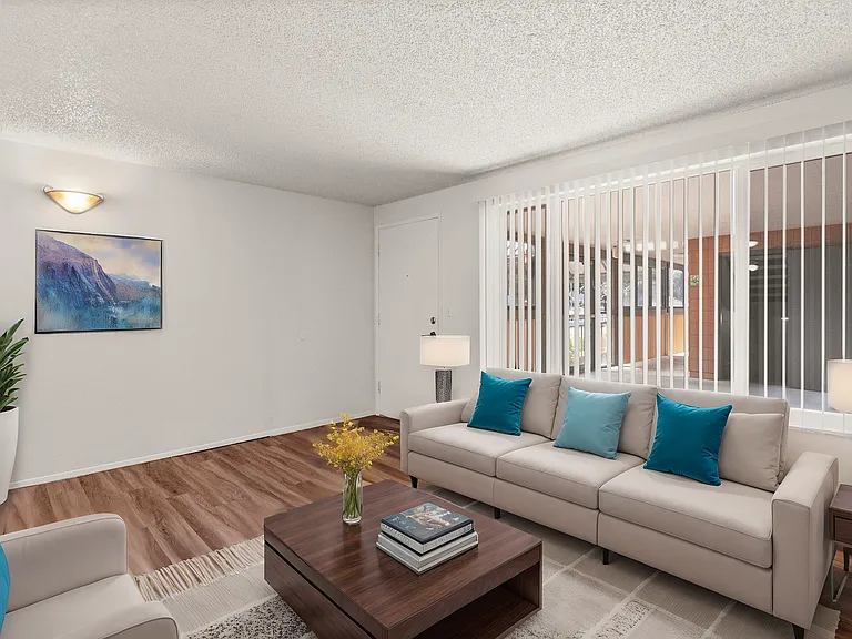 Light-filled Tacoma living room with updated flooring and an open feel. Light-filled Tacoma living room with updated flooring and an open feel.
