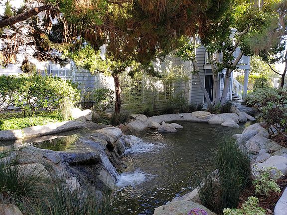 Flowing waterscape outside the unit (our unit is the bottom floor to the right of the staircase)