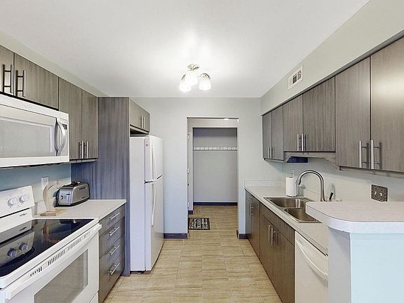 Kitchen with all appliances.