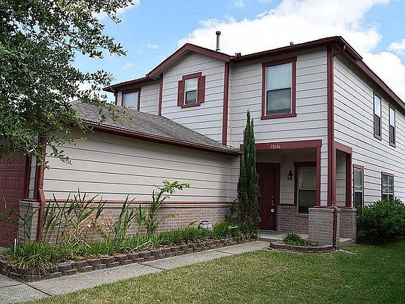 Beautiful home with brick patio and great curb appeal.