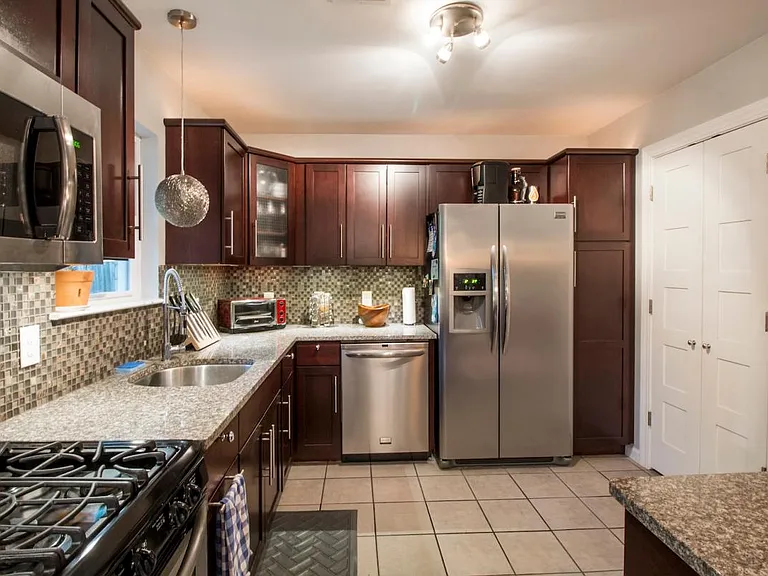 doors on right to washer, dryer and garage