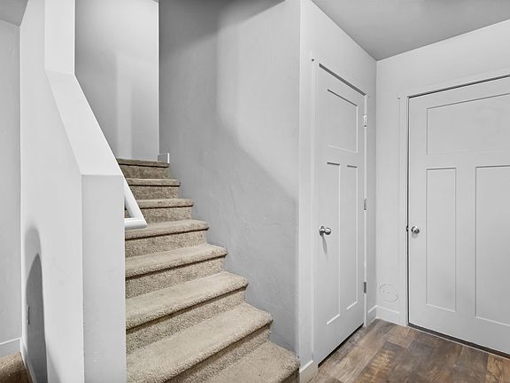 main level, living room stairs & basement & garage entry