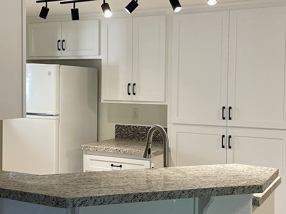 Brand new kitchen cabinets and granite countertops.