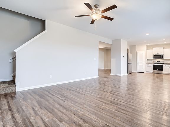 A spacious downstairs living area creates the perfect space for entertaining.