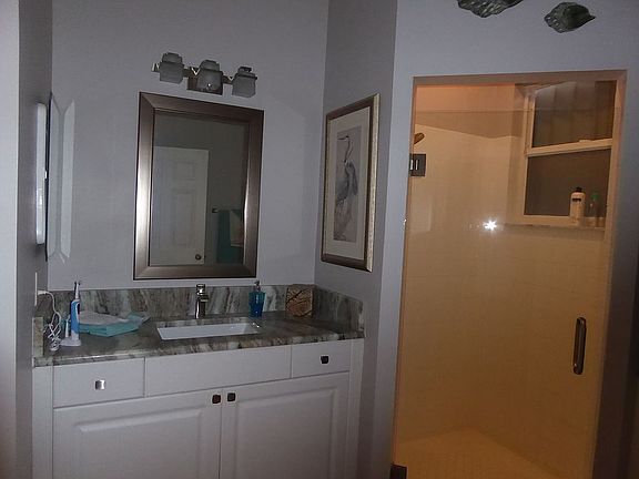 His sink in master bathroom