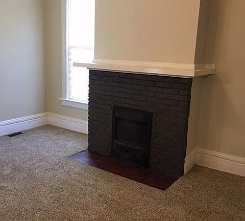 Mock fireplace in living room