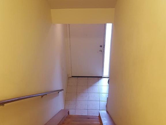 Stairs from garage/entry way