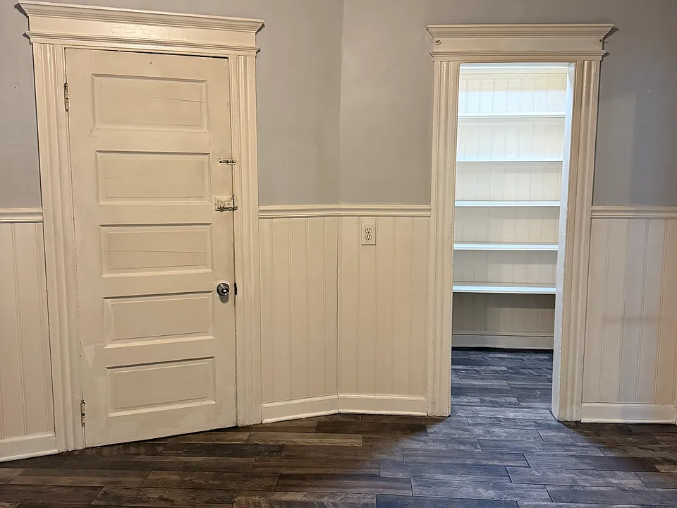 Kitchen view of walk in pantry