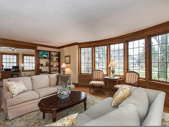 Wonderful bow windows look over the front yard and street views