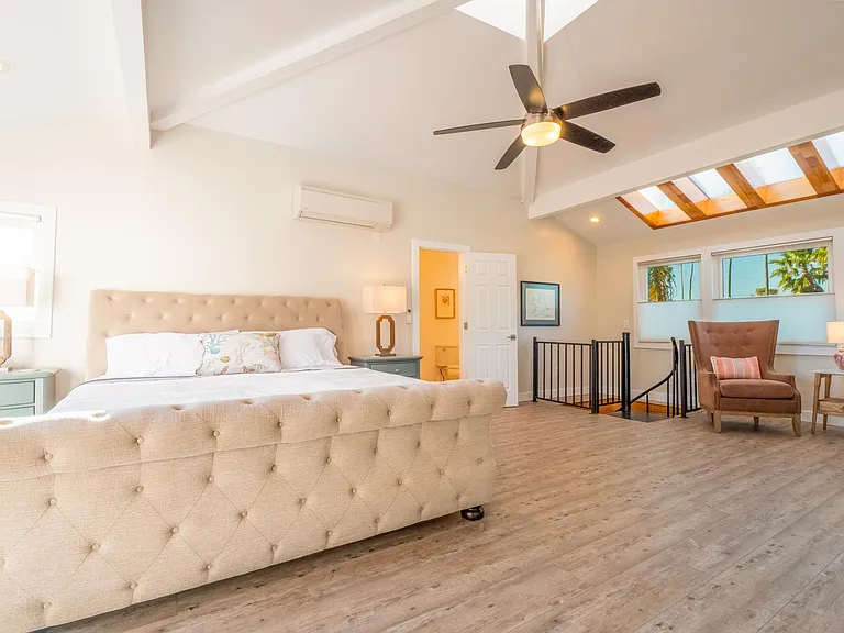 Welcome to your master bedroom with retreat. Super comfy king memory foam mattress with topper. Watch the stars through the skylights. Sitting area with big screen TV.