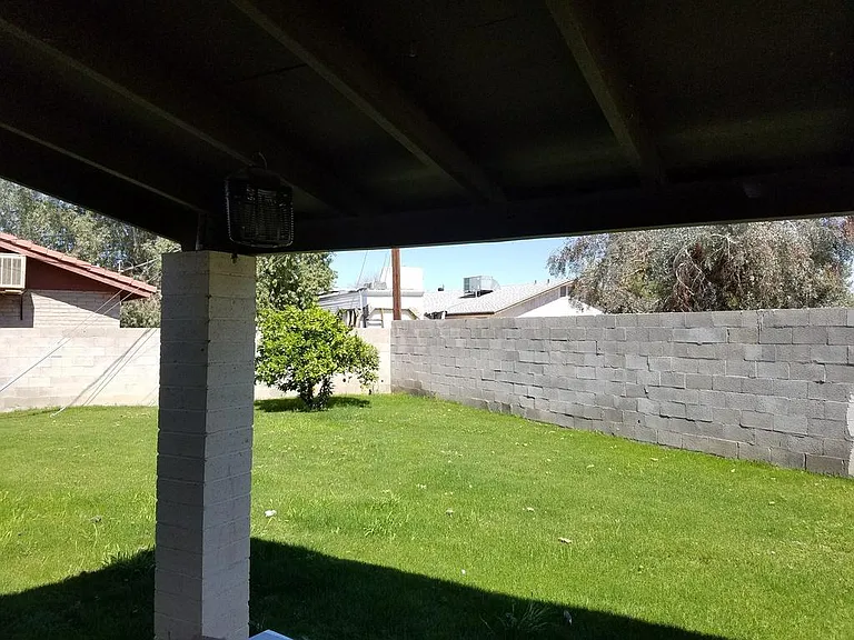 Back fenced yard (one of two).