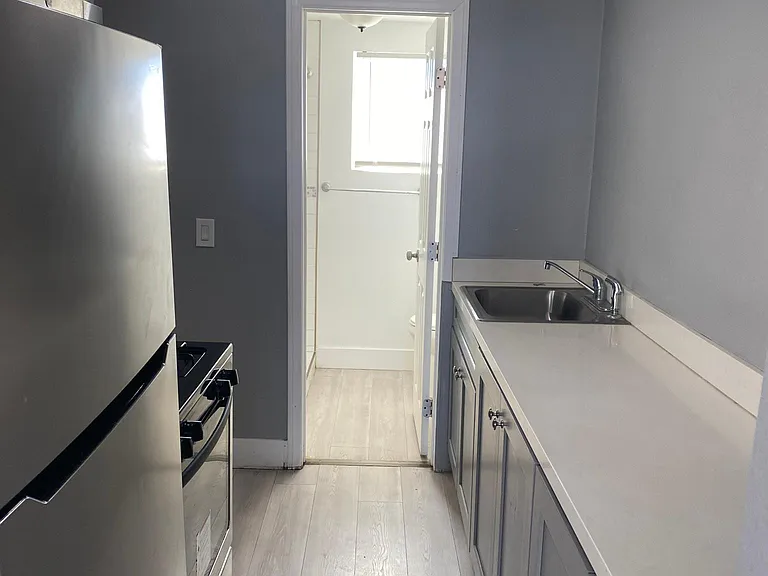 Attached small unit kitchen