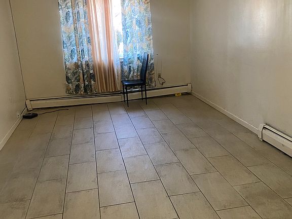 2nd image of 1230 E 223rd St APT 1