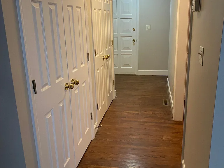 Hallway with 2 large closets
