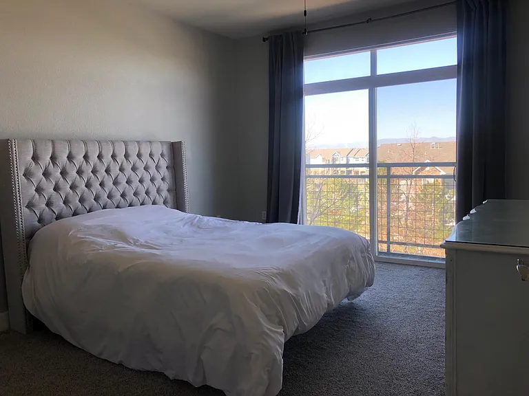 Master bedroom has small balcony and sliding glass doors with a view! Features 2 closets: 1 walk-in closet and 1 regular closet. Master bathroom attached