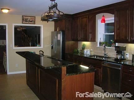 2nd View of Kitchen
						:
						Opening in this picture is perfect pass through to bar area.