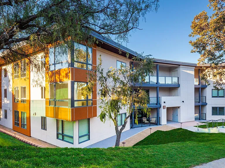Gorgeous landscaping surrounds all 7 buildings where large trees provide shady areas to relax outside.