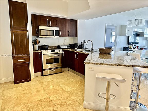 3rd image of 19900 E Country Club Dr APT 1218