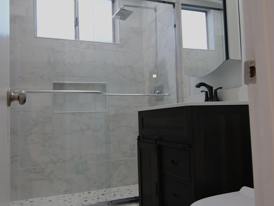 Shower in downstairs bathroom.