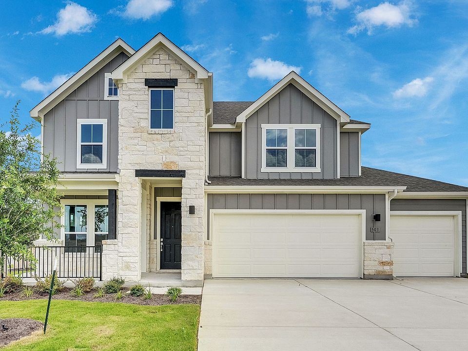 Experience timeless elegance with a stone facade and expansive double garage in Rosewood, Spring Cre