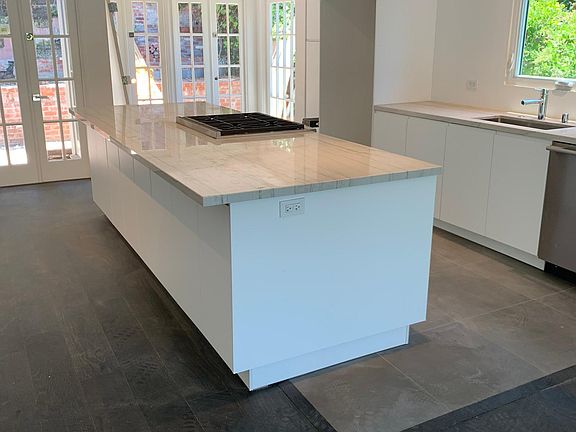Open kitchen with view to back patio