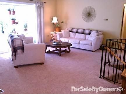 Spacious Living Room
						:
						Note the Spiral Staircase