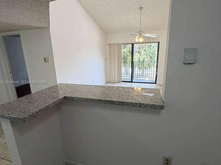 7160 NW 179th St #310 — Photo 11