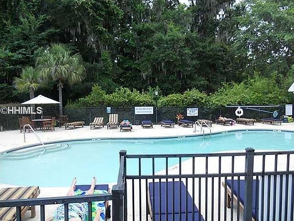 Community pool area has adult and kiddie pools