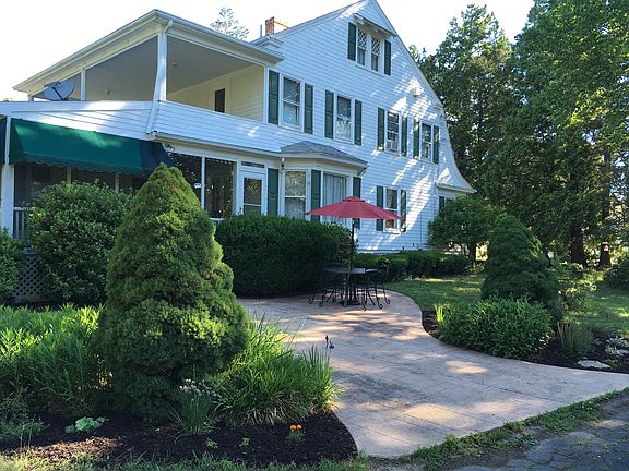 Side entrance with patio 