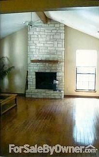 Living Room
						:
						Bruce wood Floors, stone fireplace, mini blinds, 4 windows for light